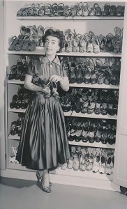 Joan Crawford shows off one her 500 pairs of shoes 1954 6 23