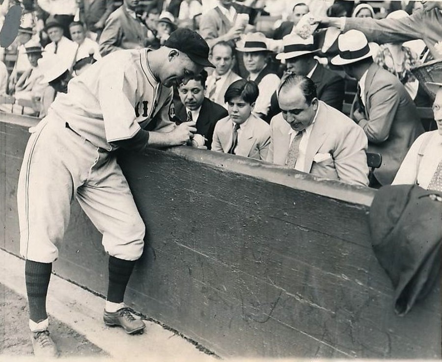 Al Capone sees a Cubs game with son as Gabby Hartnett signs autograph 1931 9 10