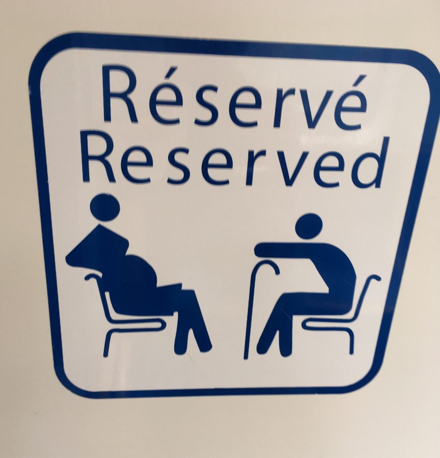 reserved seating for pregnant women and elderly french metro sign